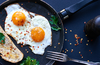 Breakfast of fried eggs in a flying pan