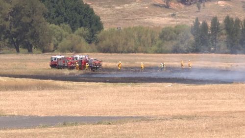 The crash ignited a minor grass fire, which was quickly extinguished. (9NEWS)