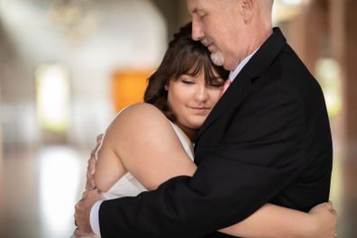 Daughters stage wedding dance with their dying father