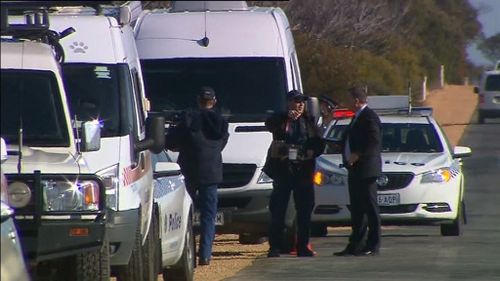 Investigators at the scene. (9NEWS)