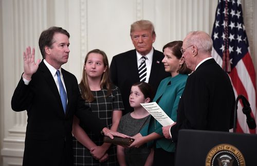 US Supreme Court Justice Brett Kavanaugh is sworn in at the White House.
