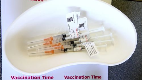 The Pfizer vaccine is prepared at the Royal Prince Alfred Hospital Vaccination Hub in Sydney,