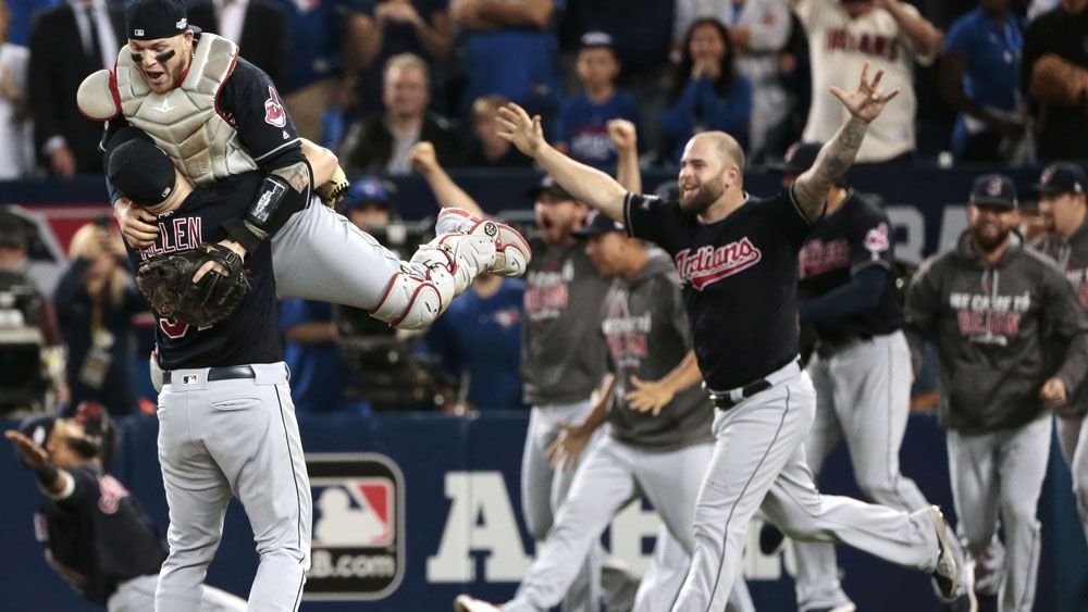 Cleveland Indians celebrate after defeating Toronto to make the major League World Series.(AAP)