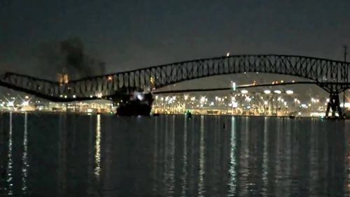 Parts of the Francis Scott Key Bridge remain after a container ship collided with a support Tuesday, March 26, 2024, in Baltimore.