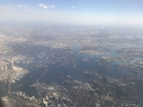 A haze over Sydney was photographed from the air today. (Picture: Emily Wheeler)