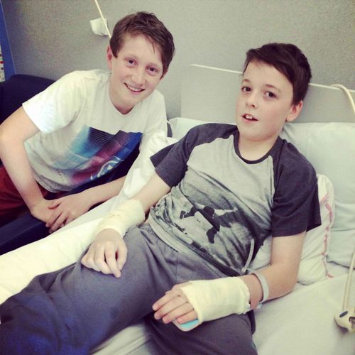 Levi Childe is visited by a friend in hospital. (Supplied)