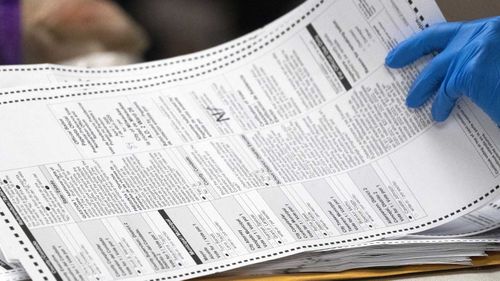 Early ballots are reviewed in Milwaukee, Wisconsin.