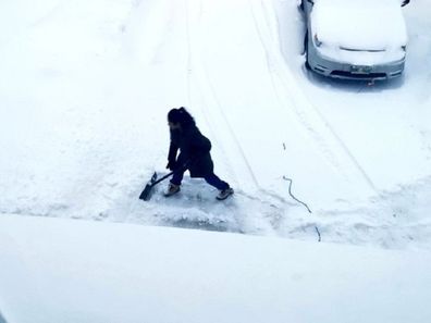 Canadian politician wife shoveling snow