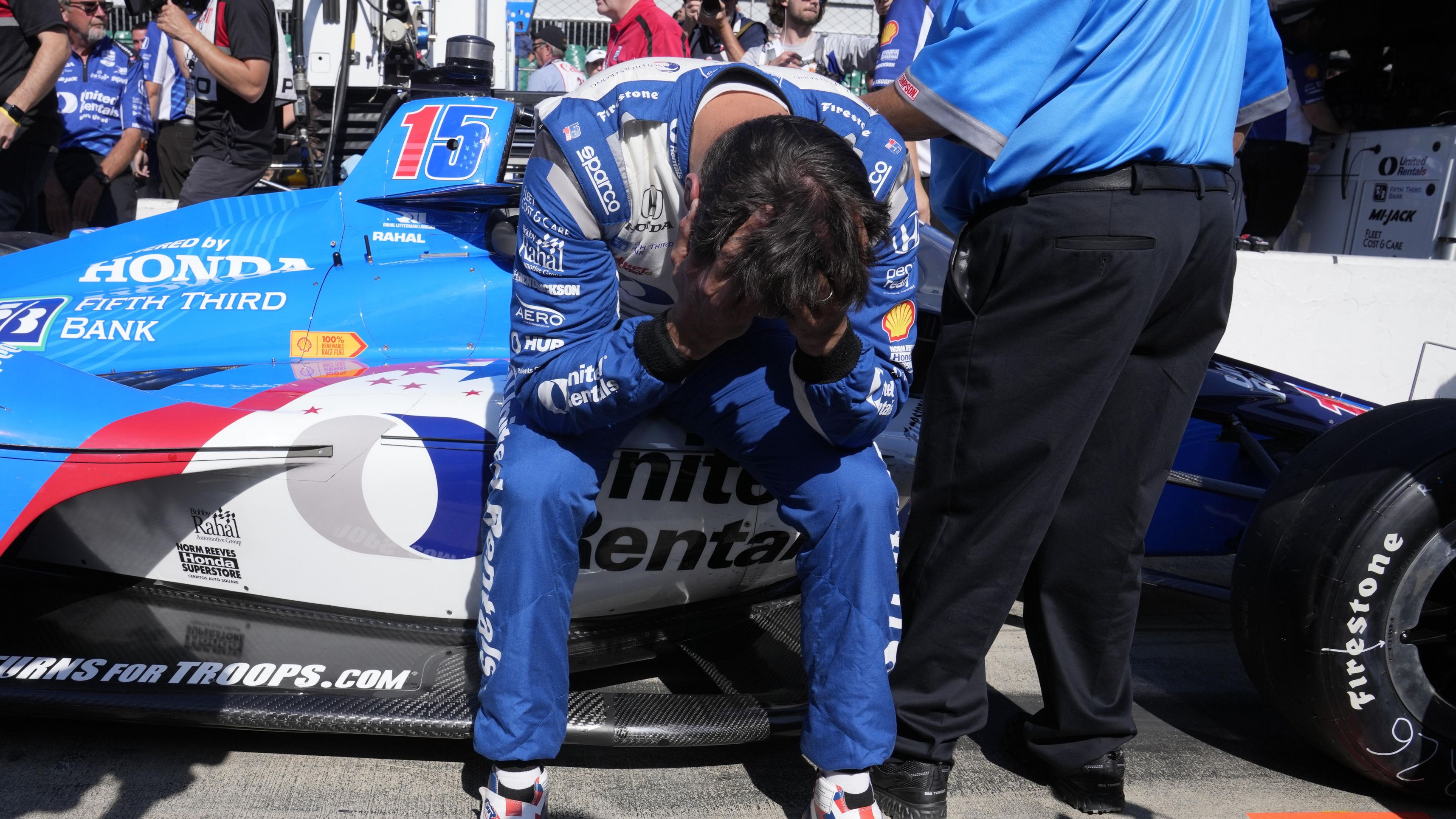 Graham Rahal sits on the side of his car after failing to make the field during qualifications for the Indianapolis 500.