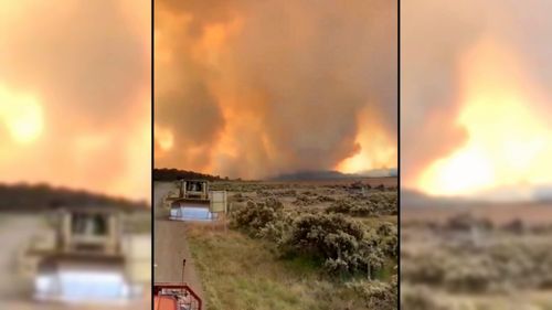 The blaze has sparked emergency warnings, urging those nearby to get out now.