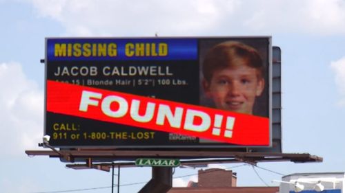 Another billboard breaks the happy news that Jacob had been found living in the basement of a home where people who knew his mother lived.