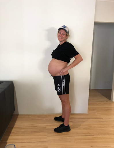 Fit pregnant woman in activewear