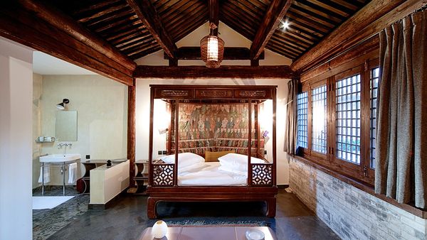 Bedroom and bathroom in the Temple Hotel (Facebook)