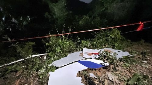 In this photo released by Chinas Xinhua News Agency, debris is seen at the site of a plane crash in Tengxian County in southern Chinas Guangxi Zhuang Autonomous Region, Tuesday, March 22, 2022. A China Eastern Boeing 737-800 with more than 100 people on board crashed in a remote mountainous area of southern China on Monday, officials said, setting off a forest fire visible from space in the countrys worst air disaster in nearly a decade. (Zhou Hua/Xinhua via AP)
