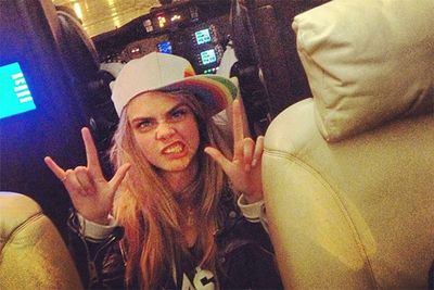 Damn you Cara, you're not supposed to be able to pull that face and still look like a supermodel. <br/><br/>The young Brit was more than a little excited aboard her private jet when she tweeted this snap to the world, writing: "My first PJ!" <br/><br/>Image: Twitter @caradelevingne