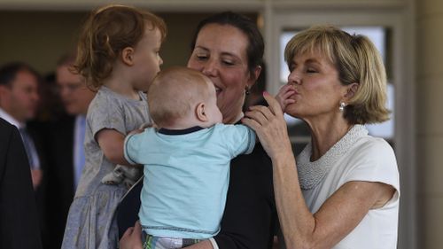 Kelly O'Dwyer's son Edward gets some attention from Julie Bishop. (AAP)