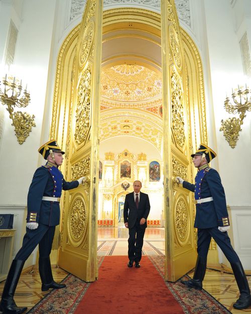 Russia's President Vladimir Putin arrives for a meeting with the newly promoted top officers from various branches of the Russian armed forces at the Kremlin in Moscow Source: AFP 