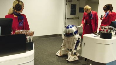 R2-D2 checks in on for the flight.