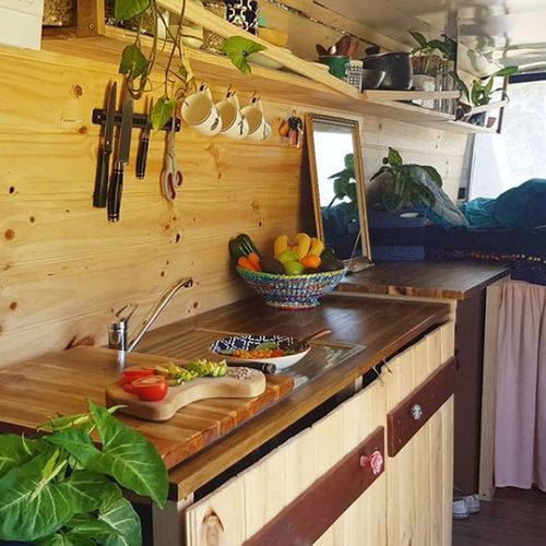 The inside of Ms Charter's van, which has a kitchenette and a full-sized sink.