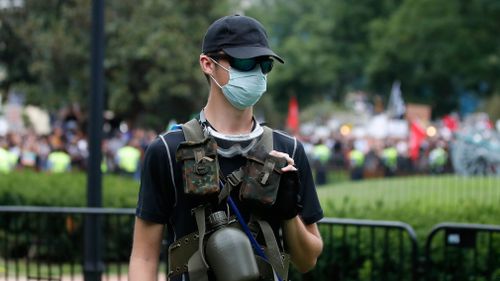 White supremacists took to the streets in military uniform.