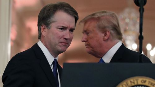 Supreme Court nominee Brett Kavanaugh and US President Donald Trump. (AAP)