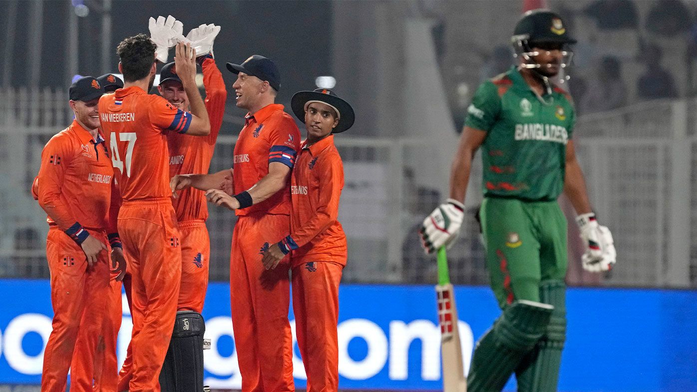 Netherlands&#x27; Paul van Meekeren, second left, celebrates with teammates the dismissal of Bangladesh&#x27;s Najmul Hossain Shanto, right, during the ICC Men&#x27;s Cricket World Cup match between Bangladesh and Netherlands in Kolkata, India,