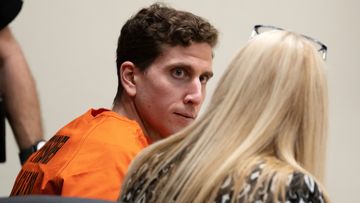 Bryan Kohberger, left, who is accused of killing four University of Idaho students in November 2022, looks toward his attorney, public defender Anne Taylor, right, during a hearing in Latah County District Court, Thursday, Jan. 5, 2023.