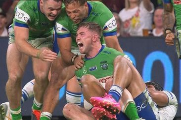The Canberra Raiders celebrate a try from Hudson Young.