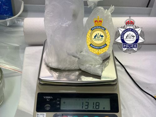 Two men have been sentenced after trying to smuggle 100 grams of cocaine into the Northern Territory, hidden inside sneakers.