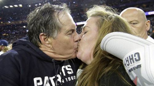 Coach's father, daughter kiss raises eyebrows