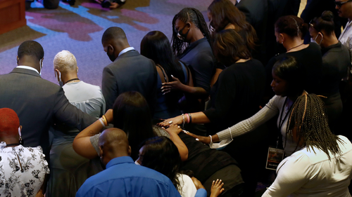 Guests pause for 8 minutes, 46 seconds of silence during a memorial service for George Floyd at North Central University Thursday, June 4, 2020, in Minneapolis. (AP Photo/Julio Cortez)