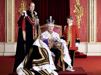 In this photo released by Buckingham Palace on Friday, May 12, 2023,  Britain's King Charles III, the Prince of Wales and Prince George pose for a photo,  on the day of the coronation, Saturday, May 6, 2023, in the Throne Room at Buckingham Palace, London. (Hugo Burnand/Royal Household 2023 via AP)