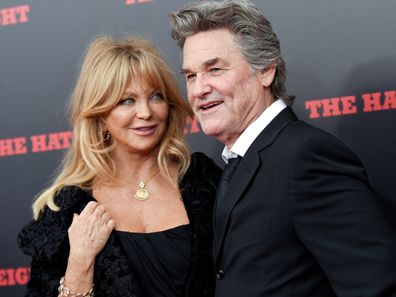 FILE - In this Dec. 14, 2015, file photo, actors Goldie Hawn and Kurt Russell attend the premiere of "The Hateful Eight" at the Ziegfeld Theater in New York. Hawn tells the British talk show "Loose Women" that she "would have gotten divorced a long time ago" and gotten married. (Photo by Evan Agostini/Invision/AP, File)