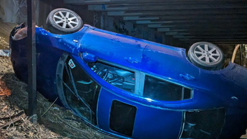 A teenager has escaped serious injury after his car crashed through the barrier of an overpass bridge and dropped five metres in Adelaide&#x27;s north-east.