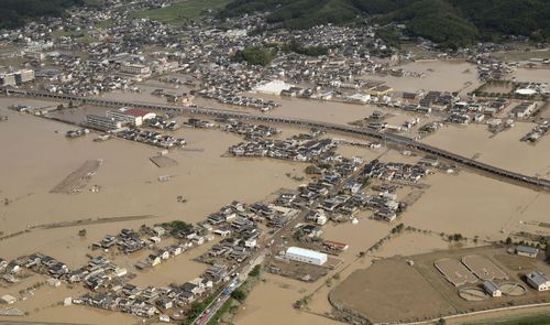 Water still swirls through most of the hard-hit city of Kurashiki. Picture: AP