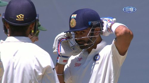 Kohli appeared to be unhurt after the nasty blow. (9NEWS)