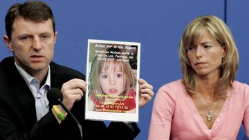 Gerry and Kate McCann, parents of Madeleine who disappeared while on holiday in Portugal in May 2007, show a picture of their daughter at a June 2007 press conference in Berlin, Germany.