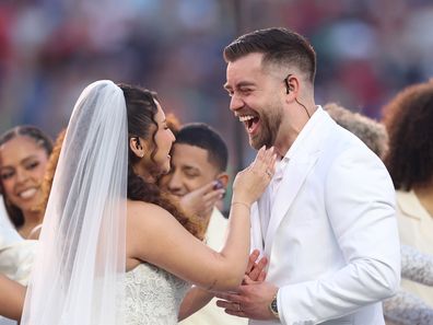 A couple marries during the Bad Bunny performance at the Super Bowl LX Halftime Show at Levi's Stadium on February 8, 2026 in Santa Clara, California. 