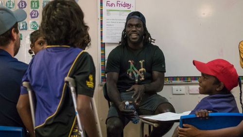 McDonald-Tipungwuti sat in on lessons in the hopes of inspiring children to overcome adversity in their own lives. (Supplied)