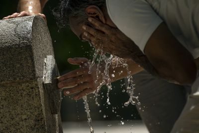 <p>Europe is&nbsp;currently in the grips of a record-breaking heatwave with temperatures climbing to 40C and beyond across the region.</p>
<p>The weather phenomenon has sparked droughts and fires across the continent, with Spain and Portugal experiencing some of the most extreme heat.</p>
<p>Pictured: A man cools off in a public fountain at the Retiro park in Madrid, Spain. Much of the Iberian Peninsula is experiencing this year's first heatwave.</p>