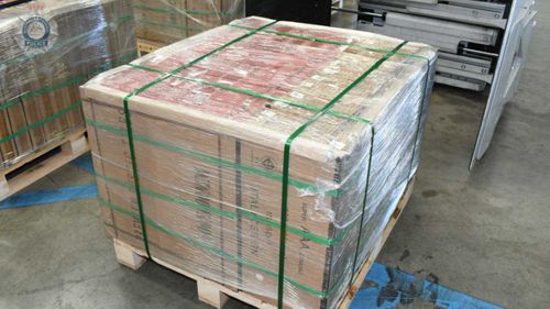 The drugs were allegedly hidden in the planks of wooden pallets used to hold tiles.