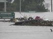Debris sits in the middle of the flooded Windsor Bridge on the outskirts of Sydney.