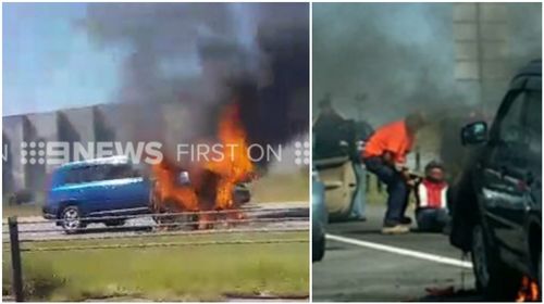 Bystanders pull motorcyclist to safety from fiery Monash Freeway crash
