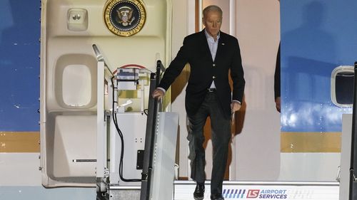 U.S. President Joe Biden arrives at the Warsaw Chopin Airport, in Warsaw, Poland, on Friday, March 25, 2022. U.S. President Joe Biden heads to Poland on Friday for the final leg of his four-day trip as he tries to maintain unity among allies and support Ukraine's defence. (AP Photo/Czarek Sokolowski)