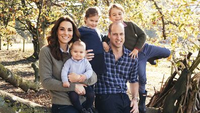 This photo released by Kensington Palace on Friday Dec. 14, 2018, shows the photo taken by Matt Porteous of Prince William and Kate, Duchess of Cambridge with their children Prince George, right, Princess Charlotte, center, and Prince Louis at Anmer Hall in Norfolk, east England, which is to be used as their 2018 Christmas card. (Matt Porteous/Kensington Palace via AP)