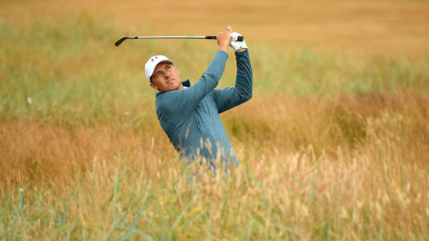 Jordan Spieth is lost in the rough during practice for the British Open