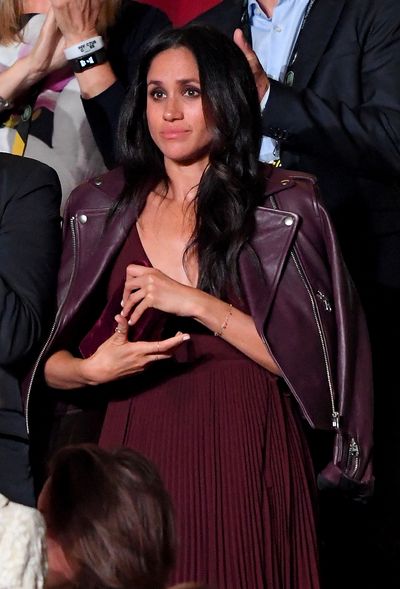 <p>Prince Harry's GF actress Meghan Markle stepped out in a mid-length maroon dress and damn if we don't now all want one. The US $185 dress, from <a href="http://intl.aritzia.com/product/beaune-dress/61870.html?dwvar_61870_color=2346" target="_blank">Aritzia's in-house label Wilfred</a>, featured a pleated skirt and wrapped bodice with sweet spaghetti straps - and it's still available!</p>
<p>The always chic Meghan topped the look off with an ox-blood leather biker jacket from the label Mackage and a velvet clutch in a matching plum shade. We were so inspired we figured we'd pull together a handy shopping guide to all things maroon.</p>
<p>Click through for royal colour block inspiration.</p>
<p> </p>