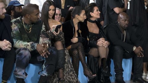 Kim Kardashian has been in France for Paris Fashion Week. Here, pictured with West (left), Kourtney Kardashian and Kris Jenner at the presentation of the Spring/Summer 2017 collection by Off-White. (AAP)