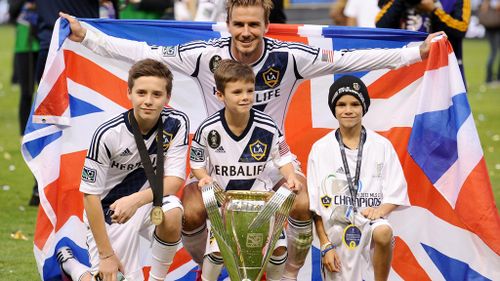 David Beckham with his sons, Brooklyn, Cruz and Romeo. (AAP)