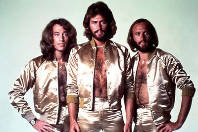 Once you’ve finished laughing at the awesome gold spandex outifts the Gibb brothers are wearing in this 1970 photo, you’ll see that poor old Robin Gibb was the skinny, quirky-looking one in the band, while the other two were (believe it or not) considered pretty hot in their day.